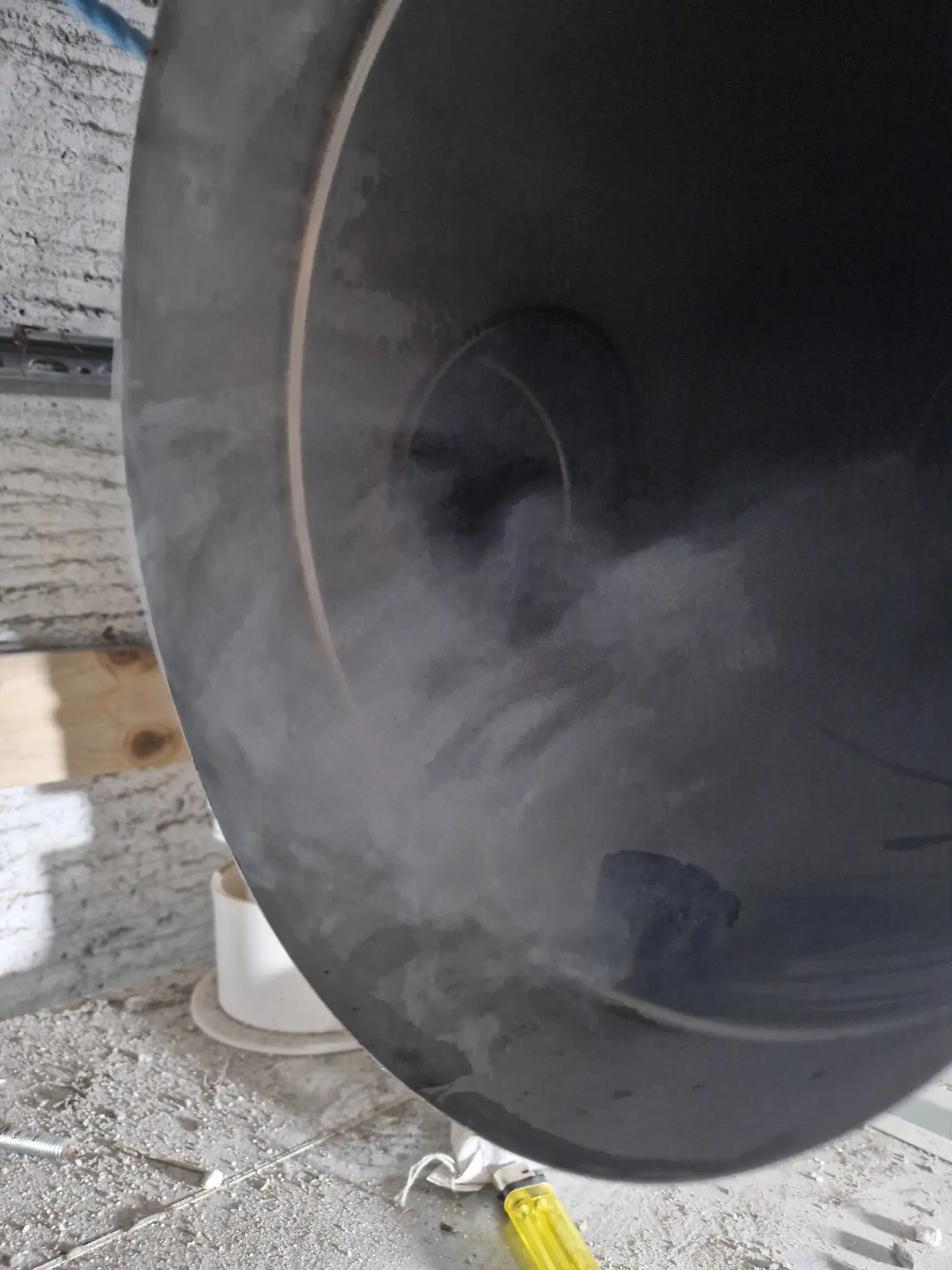Smoke test running through a flue to check the joints